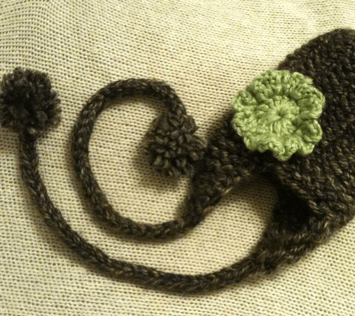 how to loom knit a hat with earflaps