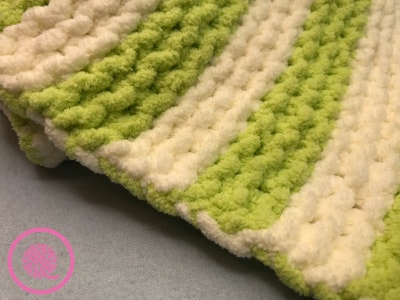 garter stitch baby blanket edge with yarn carried up side