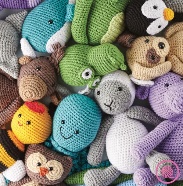 crochet cute critters book pile of finished amigurumi animals