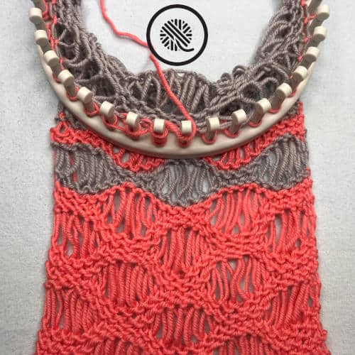 coral breezes infinity scarf in progress on the loom