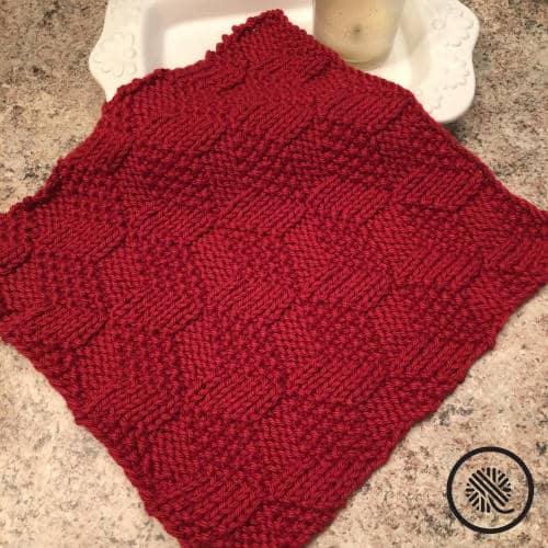 loom knit tumbling moss blocks washcloth in red