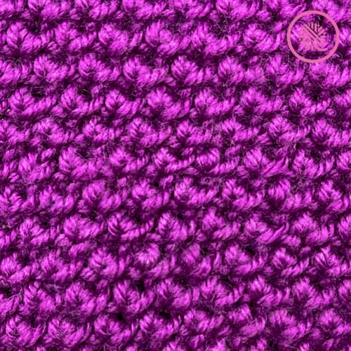 needle knit reverse edelweiss stitch pattern close up