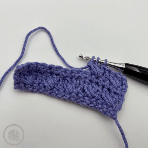 how to crochet crossed cluster stitch in progress