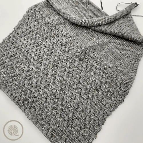 needle knit cozy ripple twist pillow progress pic