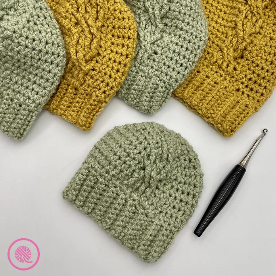 crochet cabled hats in 5 sizes from baby to adult