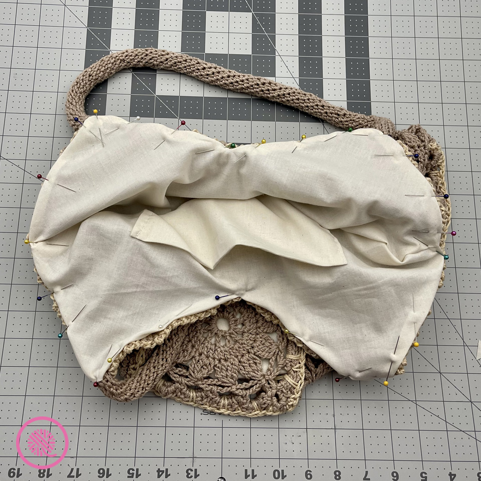 Lining pinned to bag along top edge