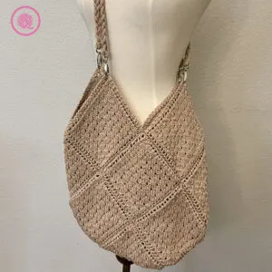 needle knit eyelet bag with handles attached